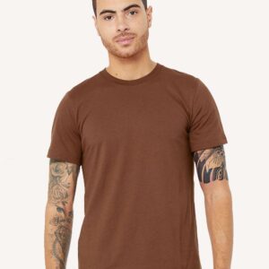 Man with tattoos wearing a chestnut colored Bella + Canvas jersey unisex short sleeved t-shirt