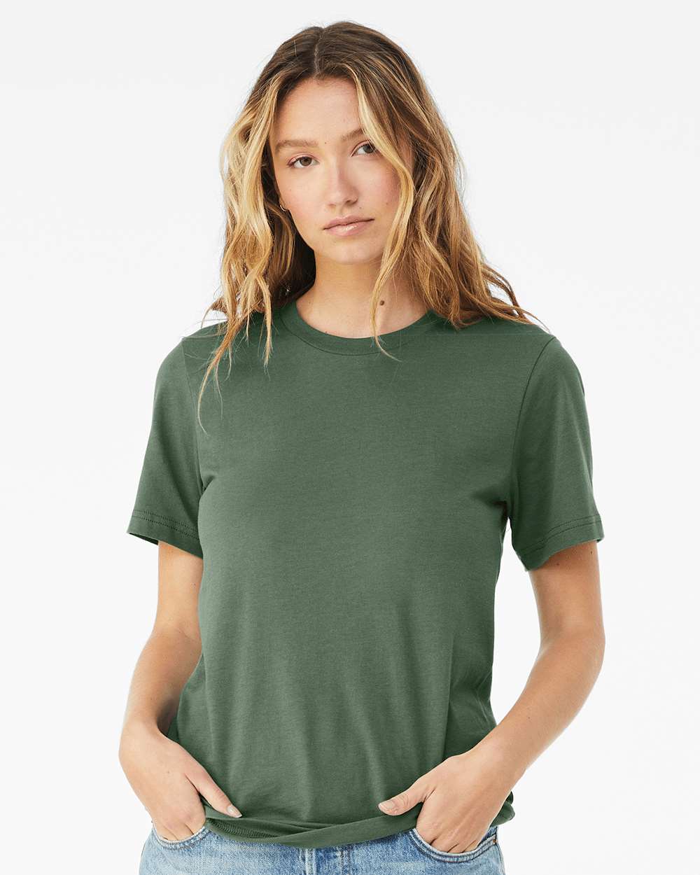 Woman wearing a pine colored Bella + Canvas jersey unisex short sleeved t-shirt
