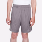 Team 365 youth performance shorts TT11SHY front view in graphite color showing team fit and seven-inch inseam
