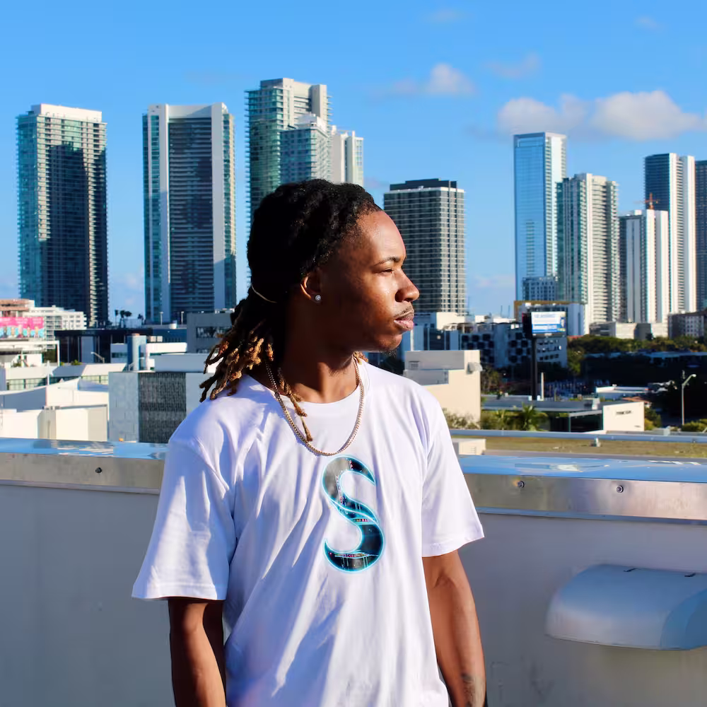 Cityscapes Slick Brand shirt on model posing in Miami