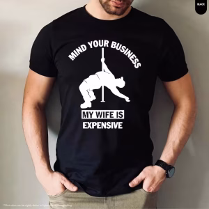 Man wearing a Funny Husband Shirt with a “Mind Your Business My Wife Is Expensive” design, perfect sarcastic married life tee and gag gift for him.