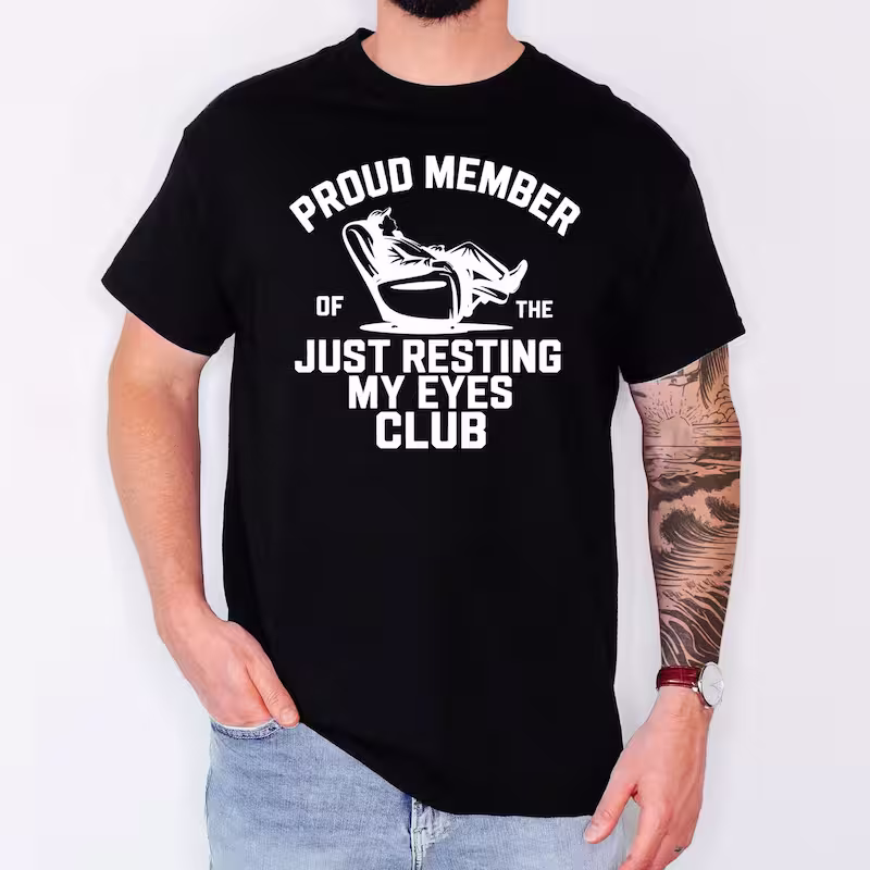 Man wearing a Proud Member of Just Resting My Eyes Shirt in the black color variant