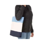 Woman holding Tri-Color Cotton Canvas Tote Bag on shoulder